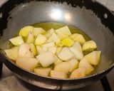 A picture of step 5 of Aloo Posto (Potatoes cooked with poppy seed paste).