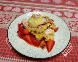 Foto del passaggio 8 della ricetta Kaiserschmarrn con fragole e zucchero a velo