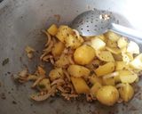 A picture of step 4 of Sauteed baby potatoes with beetroot and amaranth leaves.