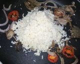 A picture of step 7 of Tender coconut and pomegranate cheesy pulao.