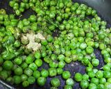 A picture of step 2 of Stir Fried Green Peas.