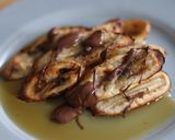 A picture of step 2 of Air fry banana in syrup and Nutella.