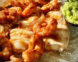 Foto del paso 5 de la receta: Calamar con langostinos al ajillo