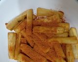A picture of step 7 of Peri Peri Sweet Potato Fries.