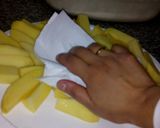 Foto del paso 3 de la receta: Papas al horno PASADAS POR HARINA