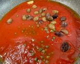 A picture of step 5 of Chicken Breast Puttanesca.
