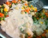 A picture of step 3 of Baked Sweet Corn and Vegetables in White Sauce.