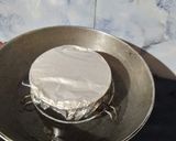 A picture of step 2 of Steamed Mango Curd.