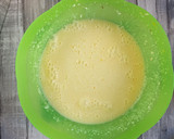 Foto del paso 3 de la receta: Bizcocho de chocolate con naranja confitada y avellanas