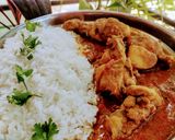 A picture of step 6 of Chicken curry with white rice.