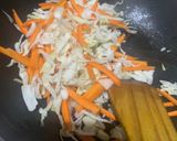 A picture of step 3 of Veg Hakka noodles with spring onions.