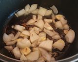 A picture of step 3 of Pork Ribs in Sauce.