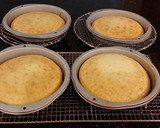 A picture of step 8 of Vanilla Lemon Raspberry Layer Cake with Whipped Cream Buttercream Frosting.
