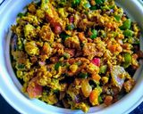 A picture of step 7 of Egg Bhuji with veggies.
