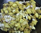 A picture of step 4 of Kolmi Shaag Bhaja (Water Spinach Stir Fry).