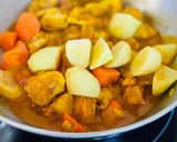 Une image de l'étape 4 de Curry de poulet au lait de coco.