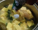 Foto langkah ke 3 dari resep Ketupat Sayur Bumbu Kuning.