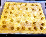 Foto del paso 5 de la receta: Hojaldre con dos tipos de queso, dos tipos de jamón y aceitunas