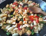 A picture of step 4 of Paella with Cuttlefish and Seasonal Vegetables.