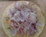 A picture of step 1 of Aloo Matar Gosht.