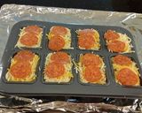 A picture of step 12 of Angel Hair Alfredo "Cakes" with Marinara Sauce and Sausage.