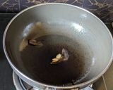 A picture of step 5 of Dudh Potol (Pointed gourd cooked in a milk gravy).