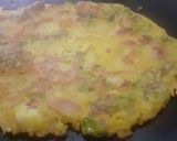 A picture of step 8 of Besan chilla.