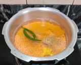 A picture of step 1 of RED LENTILS TADKA (masoor dal).