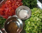 A picture of step 1 of Tomato cucumber raita.