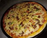 A picture of step 5 of Chicken tikka pizza without Oven.