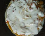 A picture of step 3 of Stuffed uttapam.