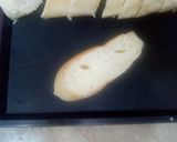 A picture of step 2 of Cheesy Garlic Bread.