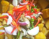A picture of step 6 of Yam and beans porridge.