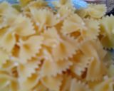 A picture of step 1 of Farfalle Pasta with cheese & Schezwan sauce.