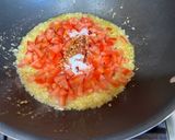 A picture of step 3 of Garlic Tomato Shrimp Pasta.