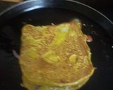 A picture of step 3 of Pudla Sandwich.