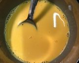 A picture of step 2 of Mango custard with gulab jamun.