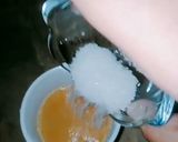 A picture of step 3 of Karak doodh pati.