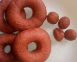 A picture of step 8 of 'Pinkie' cinnamon doughnuts.