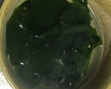 A picture of step 1 of Miso soup with Tofu and Wakame.