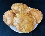 A picture of step 7 of Bajra Methi Puri.