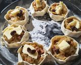 Foto del paso 2 de la receta: Empanadas canastita de cebolla, panceta y pasas de uva