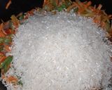 Foto del paso 3 de la receta: Arroz con verduras, carnes, mortadela y huevo