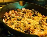 A picture of step 4 of Multi colored pilaf with broccoli, red and orange bell peppers, and carrots.