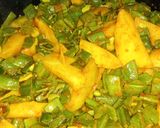 A picture of step 3 of Flat beans and potatoes with chapati.