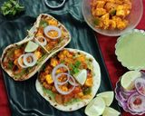 A picture of step 6 of Paneer tikka masala in naan tacos.