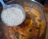 Foto del paso 4 de la receta Caldero de arroz con almejas, gambas y calamar