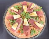 Foto del paso 4 de la receta: Pizza mediterránea | Rúcula, Jamón y Melón