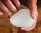 A picture of step 2 of Stuffed onion.