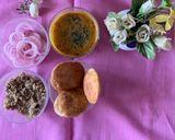 A picture of step 12 of Dal Bati Churma with pickled onions.